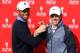 ABU DHABI, UNITED ARAB EMIRATES - JANUARY 15: Tiger Woods of the USA (L) and Rory McIlroy of Northern Ireland interlock arms whilst drinking coffee during a photocall prior to the start of The Abu Dhabi HSBC Golf Championship at the Abu Dhabi Golf Club on January 15, 2013 in Abu Dhabi, United Arab Emirates. (Photo by Ross Kinnaird/Getty Images)