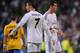 MADRID, SPAIN - OCTOBER 23: Gareth Bale (R) and Cristiano Ronaldo of Real Madrid CF look on at the end of the UEFA Champions League Group B match between Real Madrid CF and Juventus at Estadio Santiago Bernabeu on October 23, 2013 in Madrid, Spain. (Photo by Denis Doyle/Getty Images)