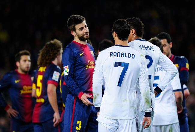 Hi-res-162786431-gerard-pique-of-fc-barcelona-argues-with-cristiano_crop_north