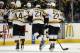 Oct 23, 2013; Buffalo, NY, USA; Boston Bruins left wing Loui Eriksson (21) is helped off the ice after being hit by Buffalo Sabres defenseman John Scott (not shown) during the third period at First Niagara Center. Bruins beat the Sabres 5-2. Mandatory Credit: Kevin Hoffman-USA TODAY Sports