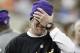 DETROIT - DECEMBER 13: Quarterback Brett Favre #4 of the Minnesota Vikings covers his face with his hand during the game against the New York Giants at Ford Field on December 13, 2010 in Detroit, Michigan. The Giants defeated the Vikings 21-3. (Photo by Leon Halip/Getty Images)