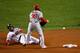BOSTON, MA - OCTOBER 23: Pete Kozma #38 of the St. Louis Cardinals drops the ball as Dustin Pedroia #15 of the Boston Red Sox slides into second base during Game One of the 2013 World Series at Fenway Park on October 23, 2013 in Boston, Massachusetts. (Photo by Jim Rogash/Getty Images)