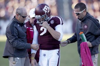 Hi-res-185369444-medics-attend-johnny-manziel-of-the-texas-a-m-aggies_crop_north