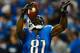 Oct 20, 2013; Detroit, MI, USA; Detroit Lions wide receiver Calvin Johnson (81) celebrates after catching a pass for a touchdown during the fourth quarter against the Cincinnati Bengals at Ford Field. Mandatory Credit: Andrew Weber-USA TODAY Sports
