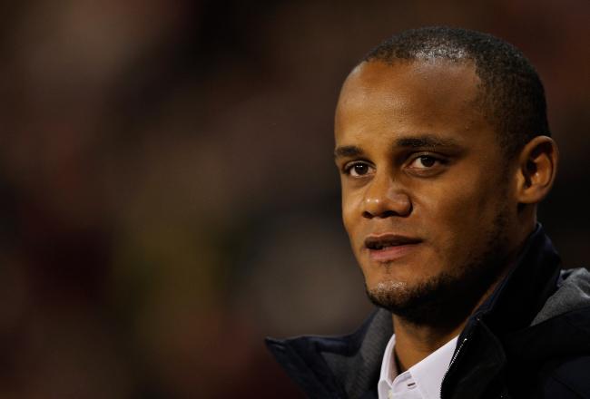 Hi-res-184762460-vincent-kompany-of-belgium-looks-on-prior-to-the-fifa_crop_north