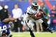 EAST RUTHERFORD, NJ - OCTOBER 06: LeSean McCoy #25 of the Philadelphia Eagles tries to get a few yards as Mike Patterson #93 of the New York Giants defends at MetLife Stadium on October 6, 2013 in East Rutherford, New Jersey. (Photo by Elsa/Getty Images)
