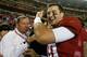 TUSCALOOSA, AL - OCTOBER 19: AJ McCarron #10 of the Alabama Crimson Tide celebrates their 52-0 win over the Arkansas Razorbacks with his father Tony McCarron at Bryant-Denny Stadium on October 19, 2013 in Tuscaloosa, Alabama. (Photo by Kevin C. Cox/Getty Images)