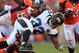 DENVER, CO - OCTOBER 13: Running back Maurice Jones-Drew #32 of the Jacksonville Jaguars is tackled as he rushes with the ball against the Denver Broncos at Sports Authority Field at Mile High on October 13, 2013 in Denver, Colorado. The Broncos defeated the Jaguars 35-19. (Photo by Doug Pensinger/Getty Images)