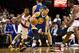 April 17, 2013; Portland, OR, USA; Golden State Warriors point guard Stephen Curry (30) dribbles around teammate power forward David Lee (10) against Portland Trail Blazers point guard Damian Lillard (0) in the first half at the Rose Garden. Mandatory Credit: Jaime Valdez-USA TODAY Sports