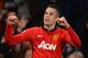 MANCHESTER, ENGLAND - SEPTEMBER 17: Robin van Persie of Manchester United celebrates scoring his team's second goal during the UEFA Champions League Group A match between Manchester United and Bayer Leverkusen at Old Trafford on September 17, 2013 in Manchester, England. (Photo by Michael Regan/Getty Images)