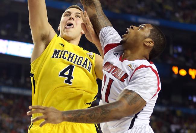 Hi-res-166733667-mitch-mcgary-of-the-michigan-wolverines-attempts-a-shot_crop_north
