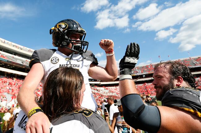 Hi-res-184227544-maty-mauk-of-the-missouri-tigers-celebrates-their-41-26_crop_north