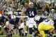 Oct 12, 2013; University Park, PA, USA; Penn State Nittany Lions quarterback Christian Hackenberg (14) signals during the fourth quarter against the Michigan Wolverines at Beaver Stadium. Penn State defeated Michigan 43-40 in overtime. Mandatory Credit: Matthew O'Haren-USA TODAY Sports