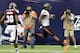 HOUSTON, TX - AUGUST 31: Jeremy Smith #31 of the Oklahoma State Cowboys scores in the fourth quarter as he beats Dee Arrington #38 of the Mississippi State Bulldogs to the endzone during the Advocare Texas Kickoff at Reliant Stadium on August 31, 2013 in Houston, Texas. (Photo by Bob Levey/Getty Images)