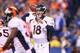 INDIANAPOLIS, IN - OCTOBER 20: Peyton Manning #18 of the Denver Broncos passes against the Indianapolis Colts at Lucas Oil Stadium on October 20, 2013 in Indianapolis, Indiana. The Colts beat the Broncos 39-33. (Photo by Dilip Vishwanat/Getty Images)