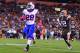 Oct 3, 2013; Cleveland, OH, USA; Buffalo Bills running back C.J. Spiller (28) rushes the ball into the end zone for a touchdown during the third quarter against the Cleveland Browns at FirstEnergy Stadium. Mandatory Credit: Andrew Weber-USA TODAY Sports