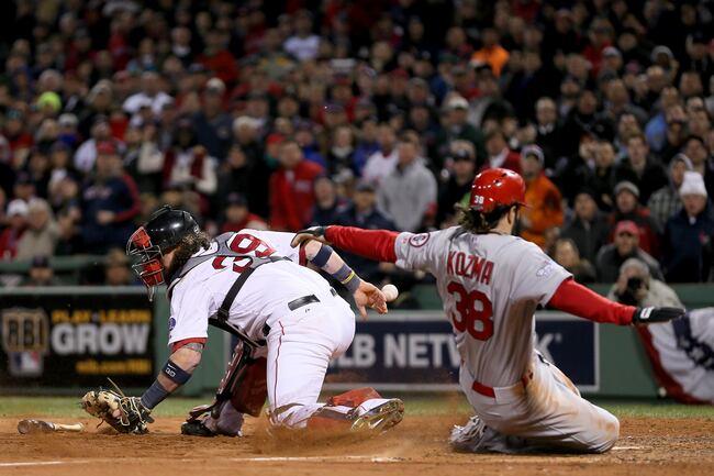 Hi-res-185770403-pete-kozma-of-the-st-louis-cardinals-scores-in-the_crop_north