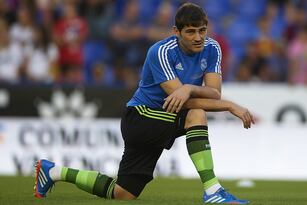Hi-res-183640760-goalkeeper-iker-casillas-of-real-madrid-looks-on-during_crop_north