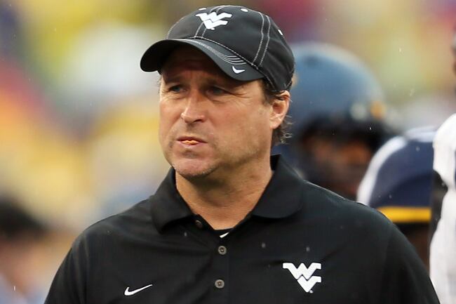 Hi-res-181476991-head-coach-dana-holgorsen-of-the-west-virginia_crop_north