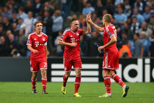 Hi-res-182946072-franck-ribery-congratulates-arjen-robben-of-muenchen_crop_north