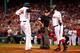 BOSTON, MA - OCTOBER 05: David Ortiz #34 celebrates a home run with Mike Napoli #12 of the Boston Red Sox in the first inning against the Tampa Bay Rays during Game Two of the American League Division Series at Fenway Park on October 5, 2013 in Boston, Massachusetts. (Photo by Jared Wickerham/Getty Images)