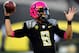 EUGENE, OR - OCTOBER 19: Quarterback Marcus Mariota #8 of the Oregon Ducks wears a pink helmet as he warms up before the game against the Washington State Cougars at Autzen Stadium on October 19, 2013 in Eugene, Oregon. (Photo by Steve Dykes/Getty Images)