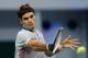 SHANGHAI, CHINA - OCTOBER 10: Roger Federer of Switzerland returns a shot to Gael Monfils of France during day four of the Shanghai Rolex Masters at the Qi Zhong Tennis Center on October 9, 2013 in Shanghai, China. (Photo by Lintao Zhang/Getty Images)