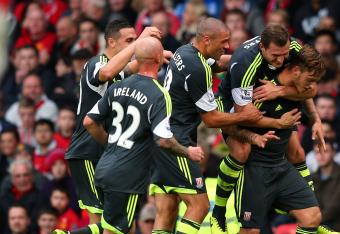 Hi-res-185923316-marko-arnautovic-of-stoke-city-is-mobbed-by-team-mates_crop_north