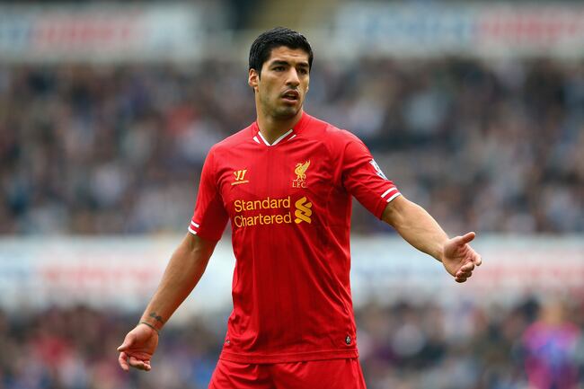Hi-res-185419617-luis-suarez-of-liverpool-reacts-during-the-barclays_crop_north