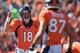 DENVER, CO - OCTOBER 13: Quarterback Peyton Manning #18 of the Denver Bronco directs wide receiver Eric Decker #87 of the Denver Broncos against the Jacksonville Jaguars at Sports Authority Field at Mile High on October 13, 2013 in Denver, Colorado. The Broncos defeated the Jaguars 35-19. (Photo by Doug Pensinger/Getty Images)