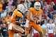 Oct 19, 2013; Knoxville, TN, USA; Tennessee Volunteers quarterback Justin Worley (14) hands the ball off to running back Marlin Lane (15) during the second quarter against the South Carolina Gamecocks at Neyland Stadium. Mandatory Credit: Randy Sartin-USA TODAY Sports