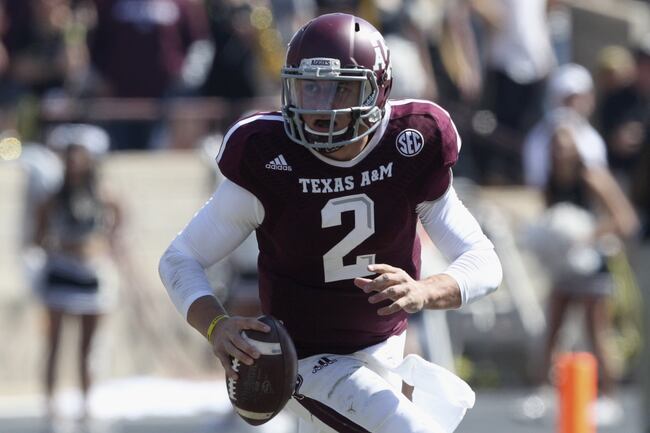 Hi-res-185942971-johnny-manziel-of-the-texas-a-m-aggies-rolls-out_crop_north