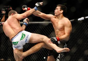 Hi-res-98930966-lyoto-machida-fights-mauricio-shogun-rua-in-their-light_crop_north