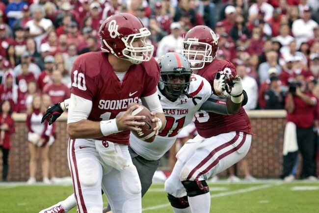 Hi-res-185963945-quarterback-blake-bell-of-the-oklahoma-sooners-looks-to_crop_north