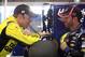 Oct 25, 2013; Martinsville, VA, USA; Sprint Cup Series driver Matt Kenseth (20) talks with driver Jimmie Johnson (48) during practice for the Goody's Fast Relief 500 at Martinsville Speedway. Mandatory Credit: Peter Casey-USA TODAY Sports