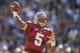 TALLAHASSEE, FL - OCTOBER 26: Jameis Winston #5 of the Florida State Seminoles throws for a touchdown pass against the North Carolina State Wolfpack during the first half at Doak Campbell Stadium on October 26, 2013 in Tallahassee, Florida. (Photo by Jeff Gammons/Getty Images)