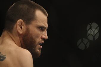 Hi-res-109465266-jon-fitch-of-the-usa-looks-across-the-octagon-at-bj_crop_north