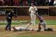 Oct 26, 2013; St. Louis, MO, USA; St. Louis Cardinals designated hitter Allen Craig (21) scores the winning run on an obstruction call even though Boston Red Sox catcher Jarrod Saltalamacchia (39) gets the tag on him during the ninth inning of game three of the MLB baseball World Series at Busch Stadium. Cardinals won 5-4. Mandatory Credit: Rob Grabowski-USA TODAY Sports
