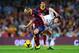 BARCELONA, SPAIN - OCTOBER 26: Andres Iniesta of FC Barcelona (L) duels for the ball with Luka Modric of Real Madrid CF during the La Liga match between FC Barcelona and Real Madrid CF at Camp Nou on October 26, 2013 in Barcelona, Spain. (Photo by David Ramos/Getty Images)