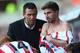 SWANSEA, WALES - OCTOBER 19: Gus Poyet (C) the manager of Sunderland passes on instructions to substitutes Fabio Borini (R) and Jack Colback (L) during the Barclays Premier League match between Swansea City and Sunderland at the Liberty Stadium on October 19, 2013 in Swansea, Wales. (Photo by Michael Steele/Getty Images)