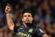 LONDON, ENGLAND - OCTOBER 27: Sergio Aguero of Manchester City celebrates scoring their first goal during the Barclays Premier League match between Chelsea and Manchester City at Stamford Bridge on October 27, 2013 in London, England. (Photo by Shaun Botterill/Getty Images)