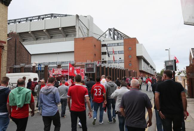 Hi-res-183151406-fans-walk-to-the-stadium-prior-to-the-barclays-premier_crop_north