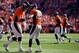 DENVER, CO - OCTOBER 27: Quarterback Peyton Manning #18 and wide receiver Wes Welker #83 of the Denver Broncos celebrate a touchdown by Welker during the first quarter against the Washington Redskins at Sports Authority Field Field at Mile High on October 27, 2013 in Denver, Colorado. (Photo by Justin Edmonds/Getty Images)