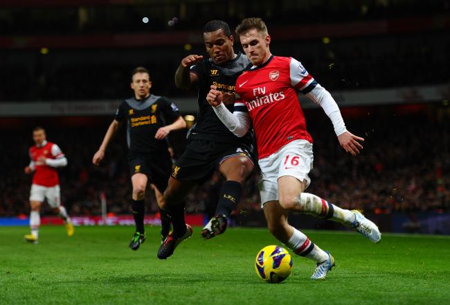 Hi-res-160387599-aaron-ramsey-of-arsenal-and-andre-wisdom-of-liverpool_crop_north