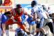 Oct 26, 2013; Blacksburg, VA, USA; Virginia Tech Hokies quarterback Logan Thomas (3) is tackled by Duke Blue Devils nose tackle Carlos Wray (98) during the first quarter at Lane Stadium. Mandatory Credit: Peter Casey-USA TODAY Sports