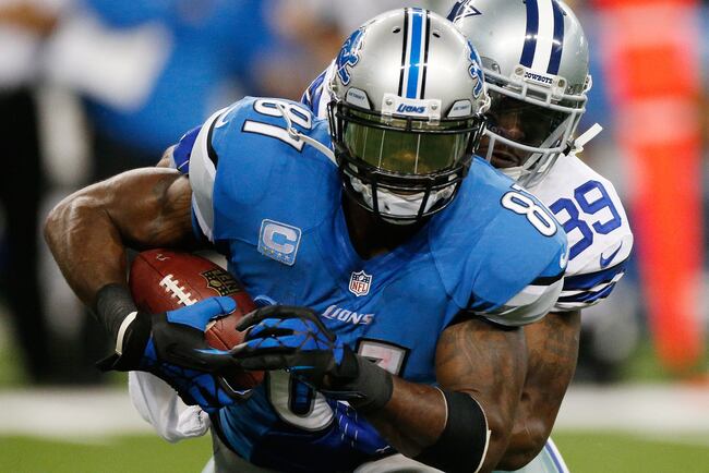 Hi-res-186047519-calvin-johnson-of-the-detroit-lions-battles-for-extra_crop_north