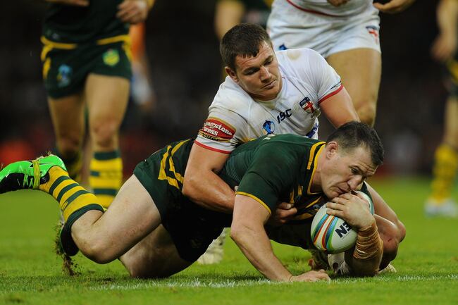 Hi-res-185928085-england-player-brett-ferres-tackles-paul-gallen-of_crop_north