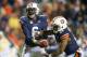 AUBURN, AL - OCTOBER 26: Quarterback Jeremy Johnson #6 of the Auburn Tigers hands the ball off to quarterback Nick Marshall #14 of the Auburn Tigers during their game against the Florida Atlantic Owls on October 26, 2013 at Jordan-Hare Stadium in Auburn, Alabama. Auburn defeated Florida Atlantic 45-10. (Photo by Michael Chang/Getty Images)