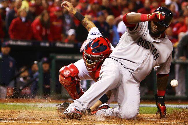 Hi-res-186064520-david-ortiz-of-the-boston-red-sox-slides-safe-into-home_crop_north