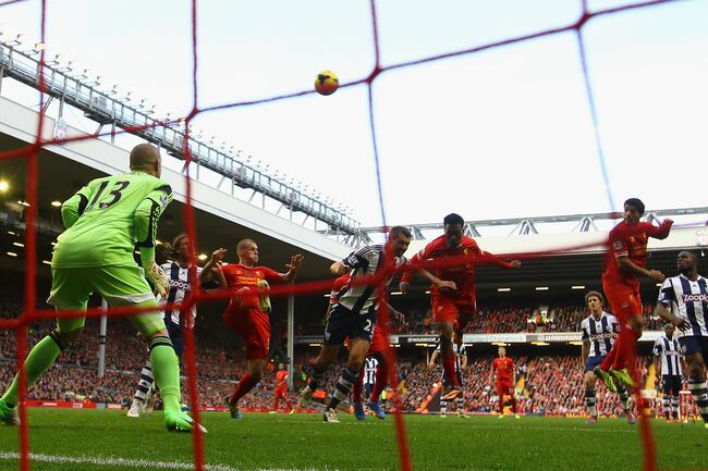 Hi-res-185928913-luis-suarez-of-liverpool-scores-his-teams-third-goal-to_crop_north